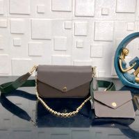 with green strap and a chain
