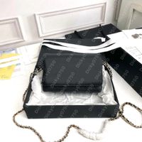 WOCBlack caviar leather golden mteal
