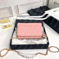 WOC Pink caviar leather golden mteal